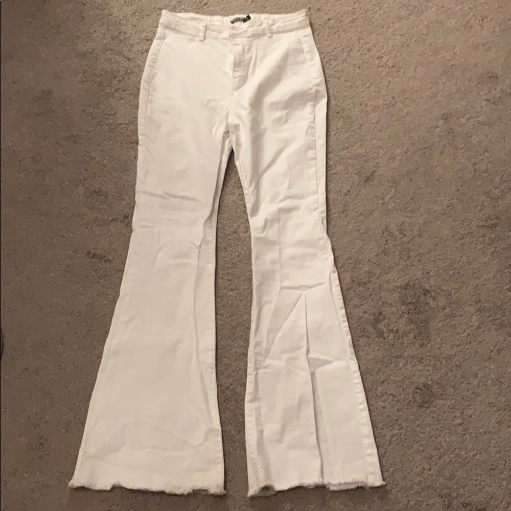 White flare jeans